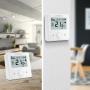 Thermostat wifi fixé sur un mur